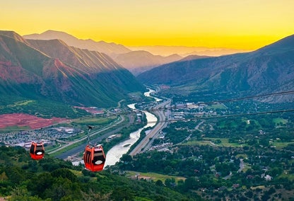 Gondolas over Glenwood Springs during sunset