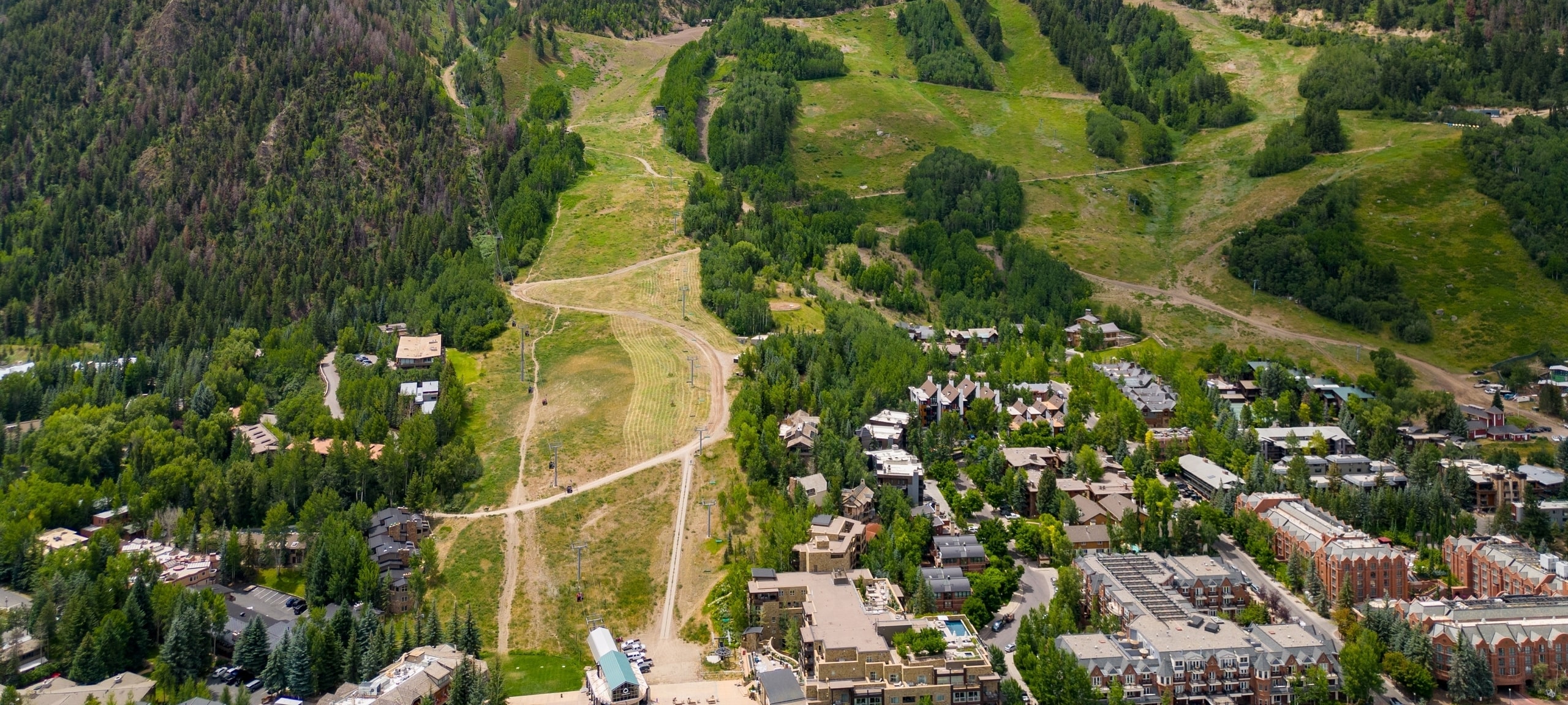 Aerial view of Aspen Mountain lifts and downtown Aspen, CO