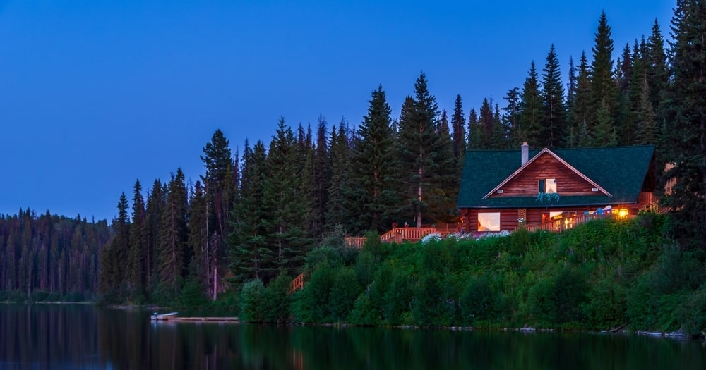 Home on riverfront at nighttime