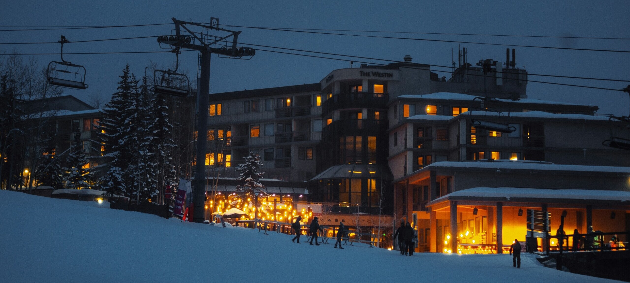 Snowmass Village Ski Resort at night in winter. Photo by Josh Hild on Unsplash.
